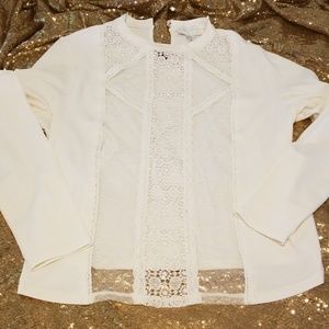 Cream stretchy knit top with sheer chest panel